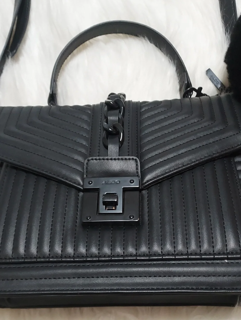 ALDO Chic Black Quilted Top-Handle Satchel with Pom Accent